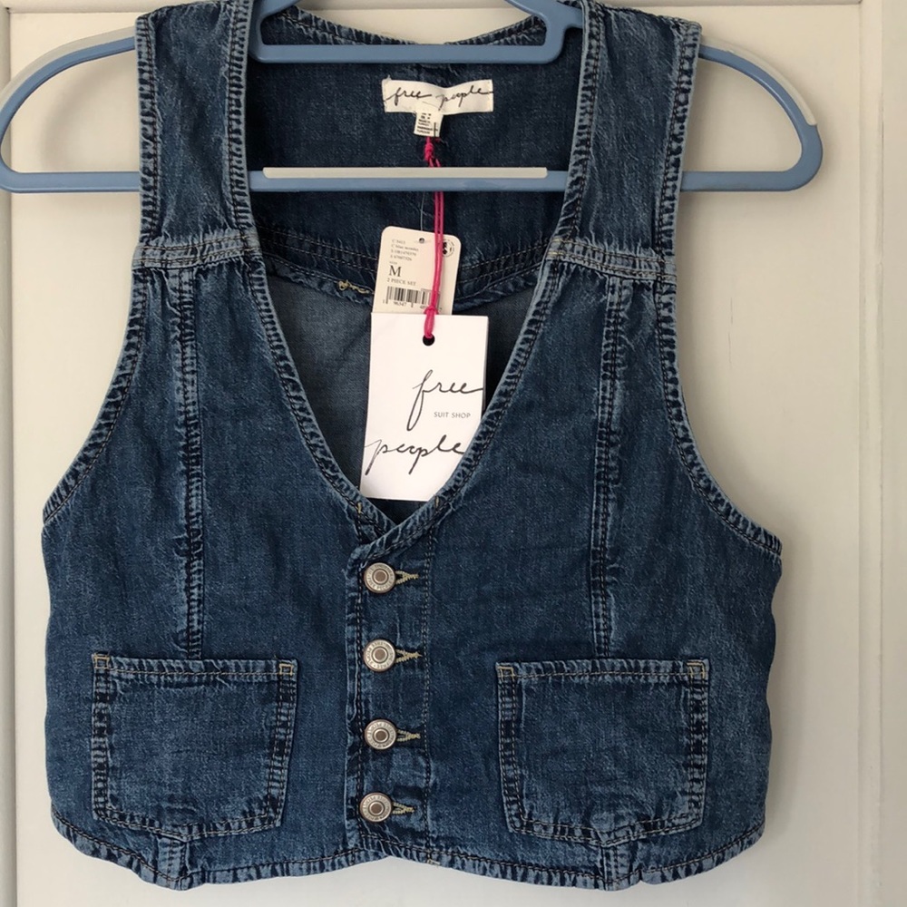 Free People. Denim vest, adjustable. 2 pocket. Size Med. distressed. NWT